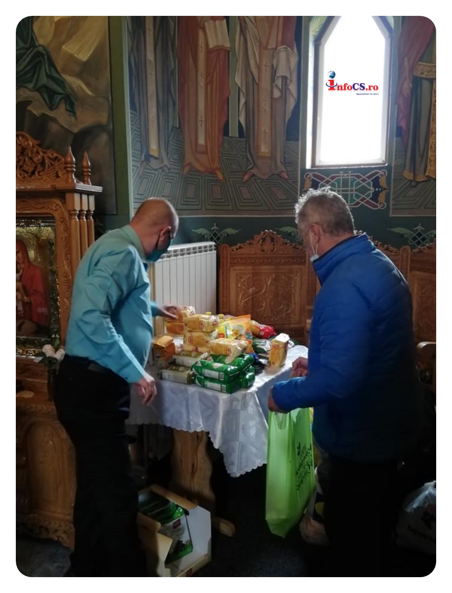 15 familii au primit alimente si daruri de la crestinii stransi in jurul Bisericii Greco-Catolice din Doman